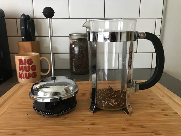 To use a French press, pour your freshly ground beans into the beaker and add hot water. Dylan Ettinger/Business Insider